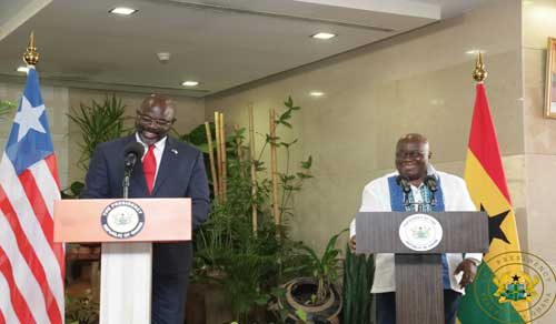Liberian President, George M. Weah (L) and Ghana’s President, Nana Akufo-Addo during the press conference at the Jubilee House.