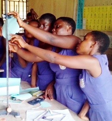 Students Work on a Project at the Axim All-Girls High School Science Center.