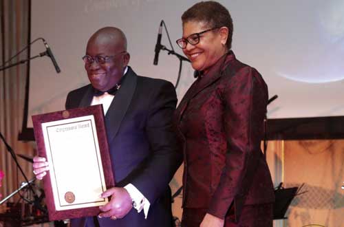 President Akufo-Addo being-presented with aCongressional Record by US Congresswoman Karen Ruth Bass